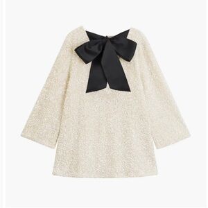 White sequin holiday dress with Black Bow